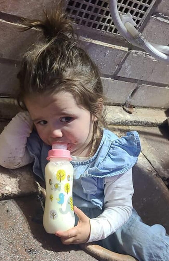 One-year-old Nayvah drinks from her bottle after getting stuck her foot stuck down a drain late last month. Picture: 9NEWS