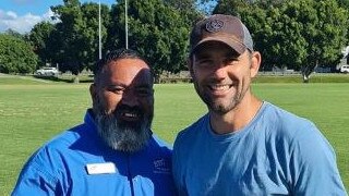 Cameron Smith with the Mudgeeraba Redbacks Junior Vice President.