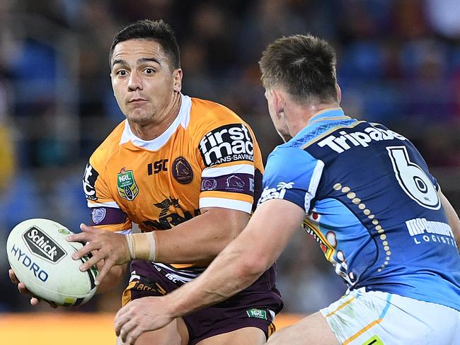 Kodi Nikorima of the Broncos looks to pass the ball during the Round 17 NRL match between the Gold Coast Titans and the Brisbane Broncos at Cbus Super Stadium in Robina on the Gold Coast. Sunday, July 8, 2018. (AAP Image/Dave Hunt) NO ARCHIVING, EDITORIAL USE ONLY