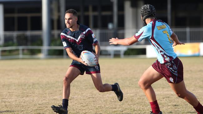 Ipswichs Jamal Laurie avoids the tackle of Keebras Zin Zan Kahui. Picture Glenn Hampson