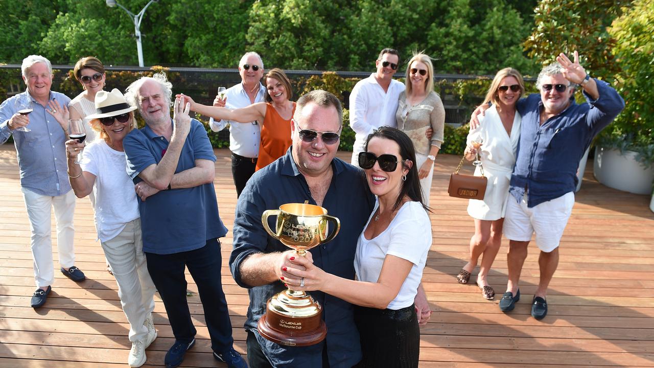 The Melbourne Cup arrives at The Prince of Wales Hotel in St Kilda to celebrate 2016 winning horse Almandin’s victory. Owners – and friends – Gerry and Val Ryan, Sue and Michael Gudinski, Chris and Kerryn Marks, Nick and Saskia Williams (front), Mark and Shelly Ruff and Leigh Ferrier and Vin Sammartino join the event. Picture: Josie Hayden.