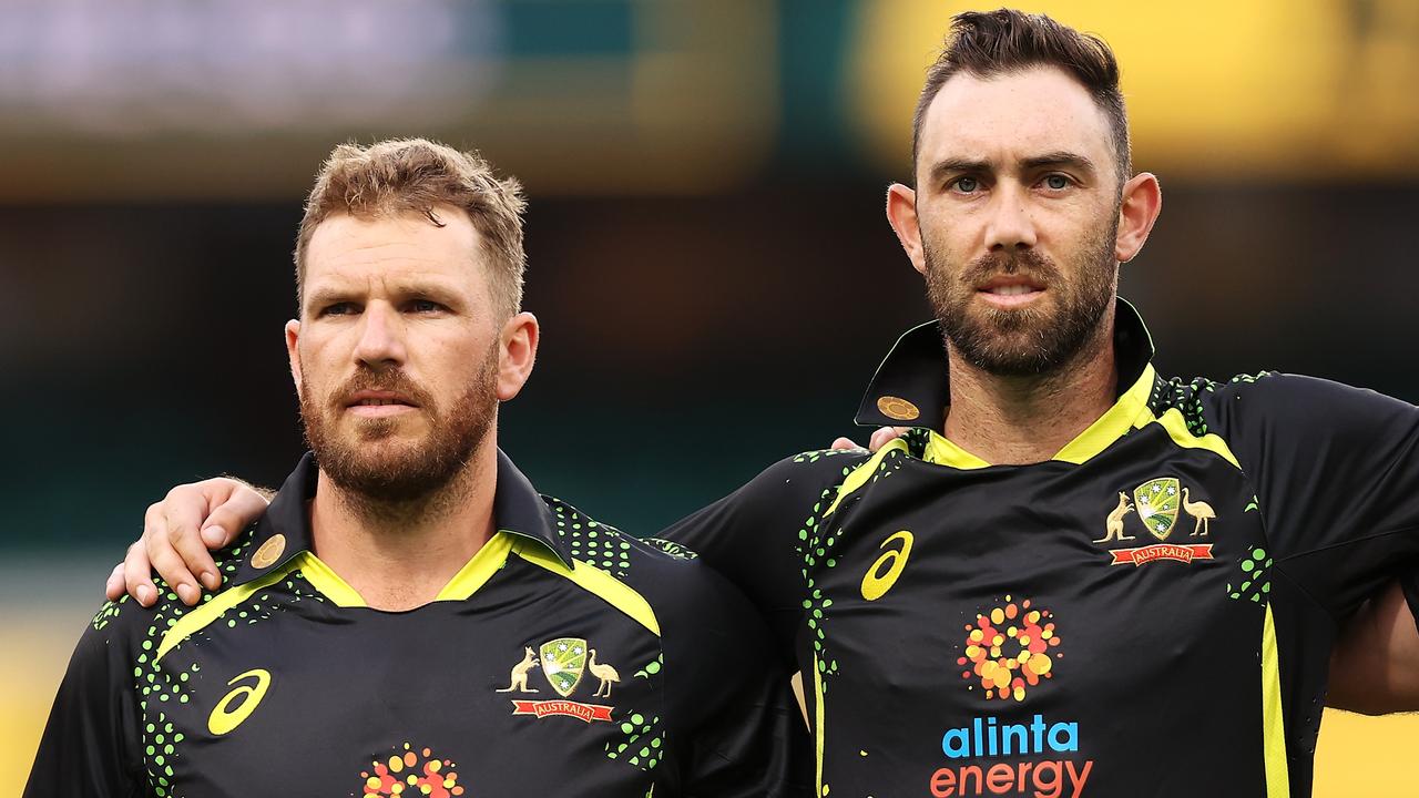 SYDNEY, AUSTRALIA - FEBRUARY 11: Aaron Finch and Glenn Maxwell of Australia sing the national anthem before play in game one in the T20 International series between Australia and Sri Lanka at Sydney Cricket Ground on February 11, 2022 in Sydney, Australia. (Photo by Mark Kolbe/Getty Images)