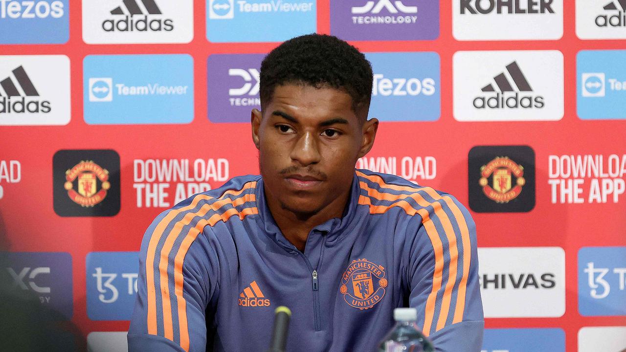 Manchester United's Marcus Rashford listens a question during a press conference in Melbourne on July 14, 2022, ahead of their exhibition football match against Melbourne Victory. (Photo by CON CHRONIS / AFP) / — IMAGE RESTRICTED TO EDITORIAL USE – STRICTLY NO COMMERCIAL USE —