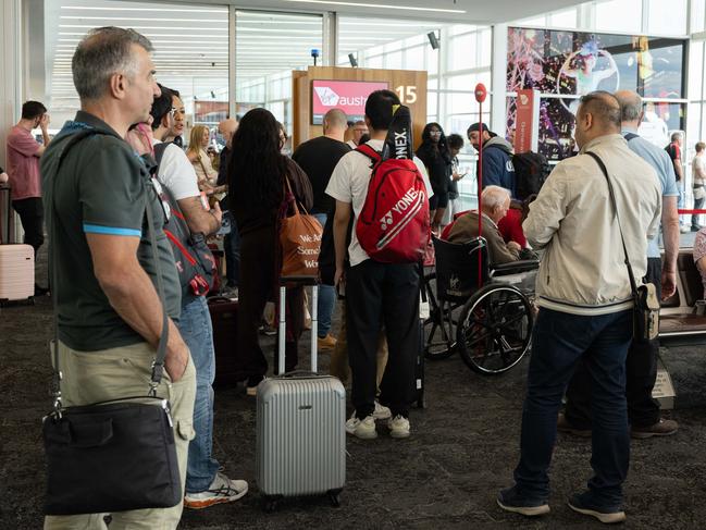 Passengers waiting to board a Virgin flight to Sydney at Adelaide Airport on Monday, December 18, 2023. (The Advertiser/ Morgan Sette)