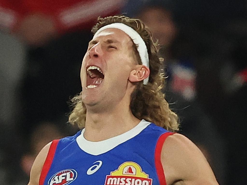 MELBOURNE, AUSTRALIA - APRIL 18: Aaron Naughton of the Bulldogs celebrates after scoring a goal during the round six AFL match between St Kilda Saints and Western Bulldogs at Marvel Stadium, on April 18, 2024, in Melbourne, Australia. (Photo by Robert Cianflone/Getty Images)