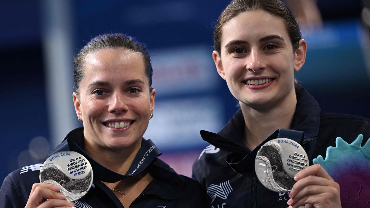 Australia's silver medallists Anabelle Smith and Maddison Keeney. Picture: Sebastien Bozon / AFP