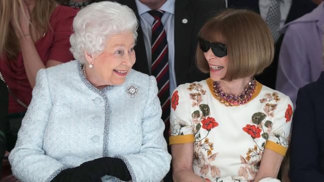 Queen Elizabeth II sits next to Anna Wintour. Picture: Yui Mok/Getty