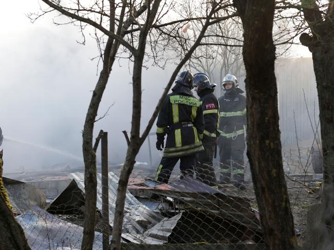 Rescuers work at the site of a drone attack in the village of Stanovoye, Moscow region, on November 10. Picture: AFP