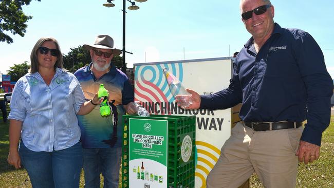 MAMS Group business manager Louise Lannen, Hinchinbrook Shire Councillor Pat Lynch and council waste education officer Craig Hutchings at Rotary Park in Ingham. Mr Hutchings said the container exchange (COEX) pay-it-forward stations in the form of baskets next to existing general rubbish bins had already replaced the recycling bins in locations such as Rotary Park in the Ingham CBD. Picture: Cameron Bates