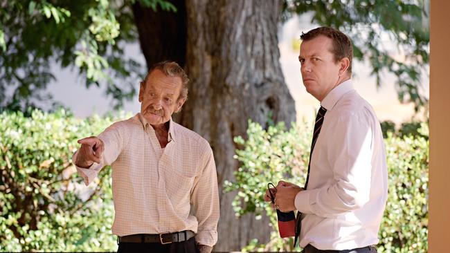 Billy Hodgetts speaks with Detective Sergeant Matt Allen outside Katherine Local Court