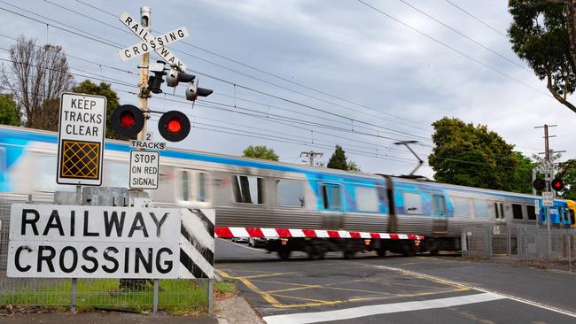 Off the rails: $14.8 billion is being used to remove level crossing to save commuters a few minutes, despite a vast number working from home. Picture: Sarah Matray