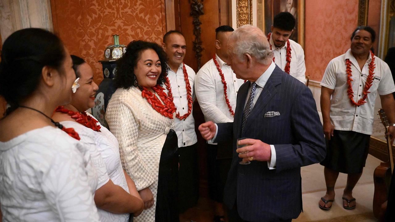 Britain's King Charles speaks to Samoan musicians during the annual Commonwealth Day Reception at Buckingham Palace. Picture: Daniel LEAL / POOL / AFP.