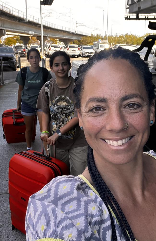 Maya Chester with her two daughters Tamar, 13 (L) and Noa, 16 at Brisbane airport before flying into Tel Aviv, Israel a week ago.