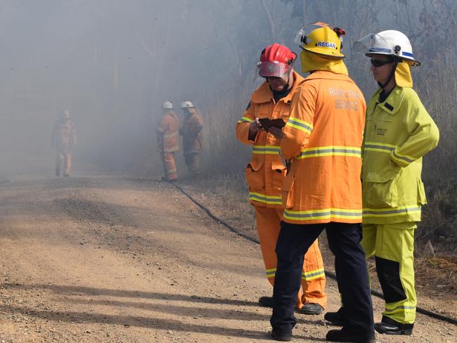 Midge Point Rural Fire Service brigade members set fire to scrub in a controlled burn on Wednesday August 5. generic, QFES, RFS, smoke. Picture: Zizi Averill