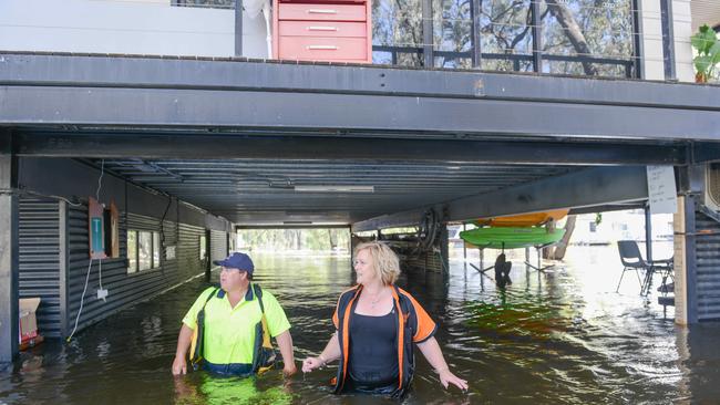 Jodie Reynolds and David Pink at their flooded Morgan property, December 9, 2022. Picture: Brenton Edwards