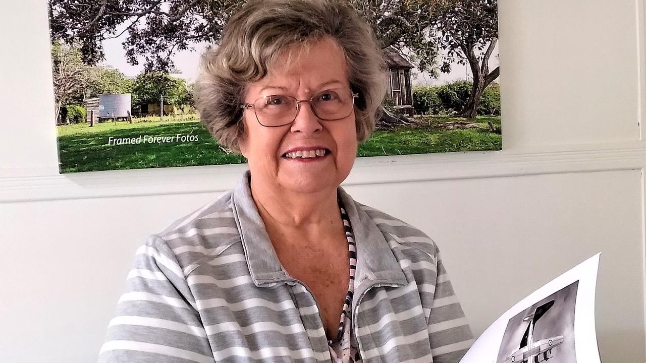 Somerset Writers Group member Beryce Nelson, with a book she contributed a story to.