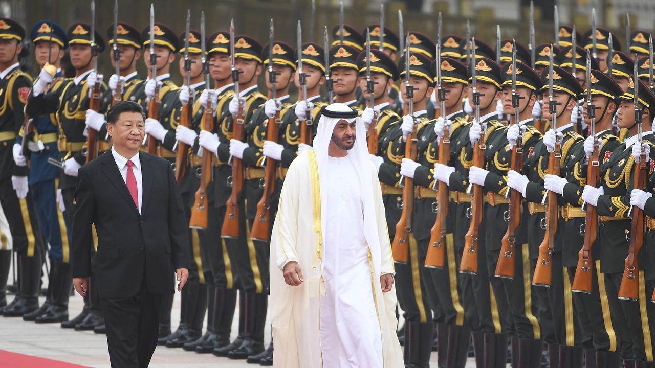 Abu Dhabi Crown Prince Mohammed bin Zayed Al Nahyan reviews a military honour guard with Chinese President Xi Jinping. Picture: GREG BAKER / AFP.