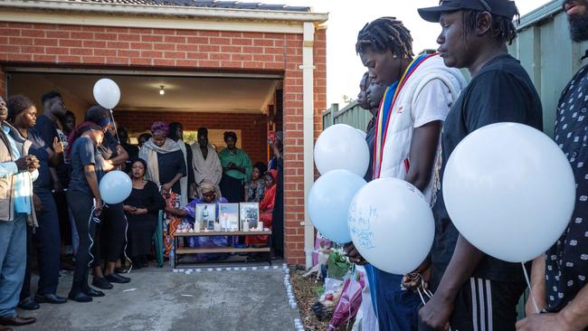 Friends and family gather to remember Atem Atem, 29, and Ayuel Akuei, 22. Picture: Mark Stewart