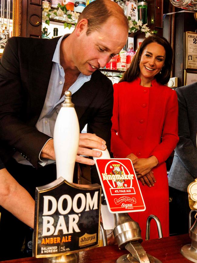 Prince William pulls a pint of Kingmaker at the Dog & Duck Pub in Soho. Picture: AFP