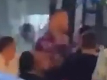 Nelson Asofa-Solomona, centre, was filmed by shocked bystanders.