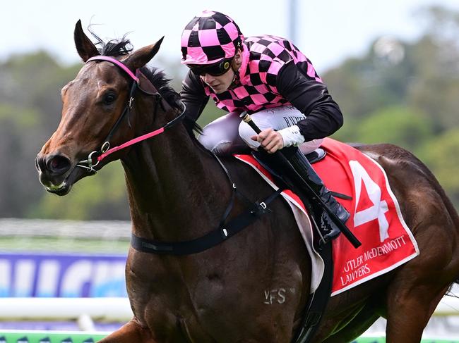 Cosmo Centaurus dashes away to win the $100,000 Inglis bonus for Rob Heathcote and jockey Bailey Wheeler at the Sunshine Coast. Picture: Grant Peters - Trackside Photography.