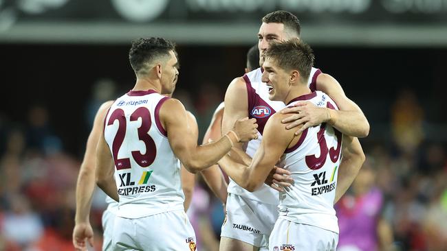 Zac Bailey (right) on his way to kicking six goals against Gold Coast. Picture: Chris Hyde/Getty Images