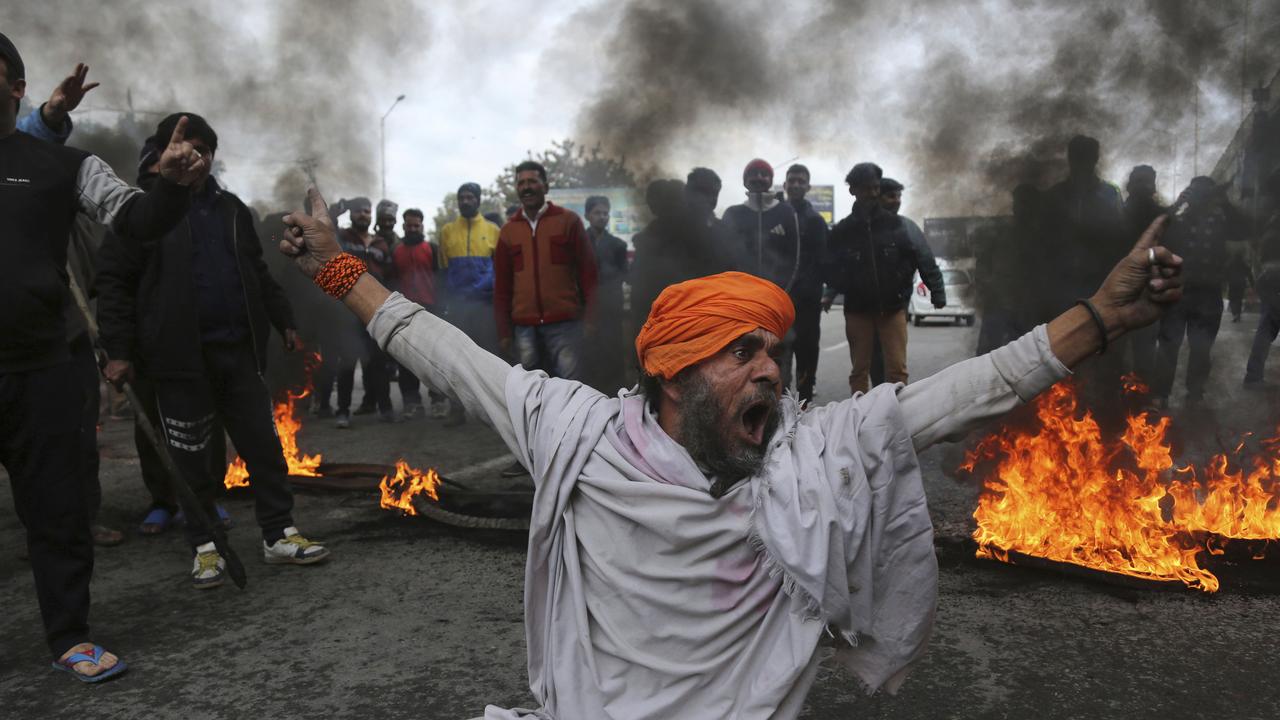 A protester shouts slogans against Thursday’s attack on a paramilitary convoy, in Jammu, India on Friday. The death toll from a car bombing on the paramilitary convoy in Indian-controlled Kashmir has climbed at least 40, becoming the single deadliest attack in the divided region’s volatile history, security officials said. Picture: Channi Anand/AP