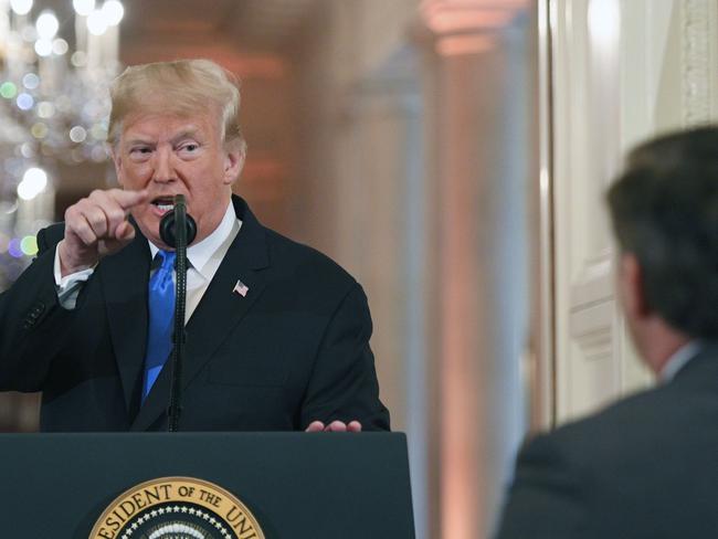 US President Donald Trump points to journalist Jim Acosta from CNN during a post-election press conference in the East Room of the White House in Washington. Picture: AFP