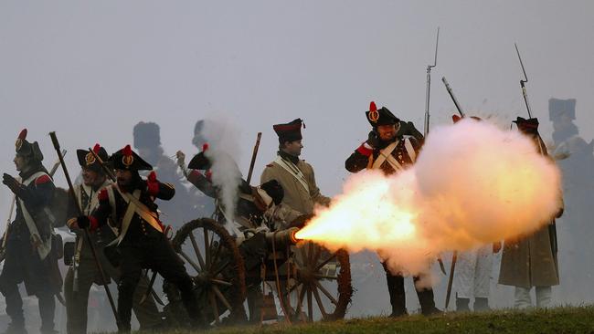 Members of military history clubs dressed as French soldiers fire from a cannon during re-enactment of the Battle of Three Emperors at Tvarozna near Slavkov, formerly Austerlitz, Dec 01, 2007. The Coalition’s rout has been compared to Napoleon’s historic victory in 1805.