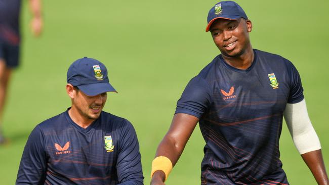 South Africa’s Quinton De Kock and teammate Lungi Ngidi at practice ahead of the Proteas opening match of the T20.