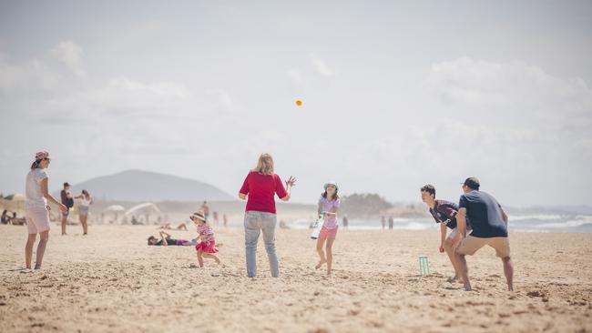 Families enjoy beach cricket at Maroochydore which has been revealed as the most popular destination according to Wotif. Picture: Ben Vos.