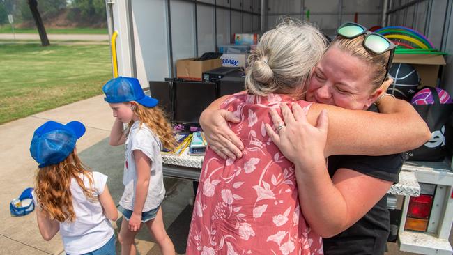 Leah Brady hugs teacher Maureen McLeish. Picture: Jason Edwards