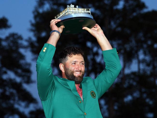 (FILES) Jon Rahm of Spain poses with the Masters trophy during the Green Jacket Ceremony after winning the 2023 Masters Tournament at Augusta National Golf Club on April 09, 2023 in Augusta, Georgia. Spain's Rahm plans on serving a Basque-style feast at this year's 2024 Masters Champions Dinner, with help from his grandmother's lentil stew recipe and star chef Jose Andres. (Photo by Andrew Redington / GETTY IMAGES NORTH AMERICA / AFP)