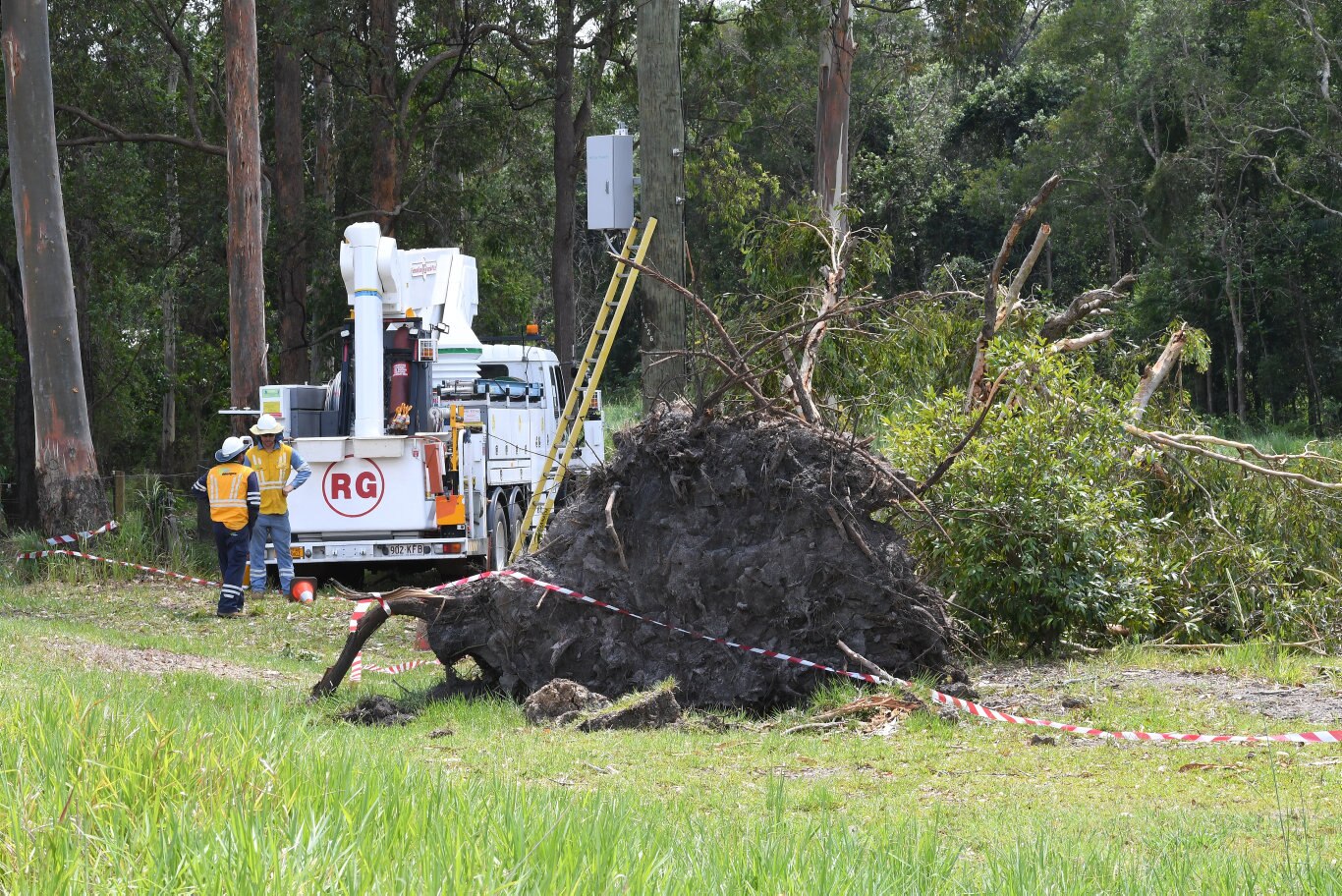 Cleaning up after the Sunday storm on the Sunshine Coast Coast.