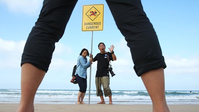 Chinese tourists Yan Suyang and his wife Chen Zaiyi at Sydney’s Manly beach in 2017. Picture: Toby Zerna