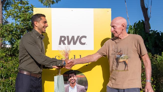 Real estate agent Sid Arora shakes the hand of Robert Bone who sold his 1.14ha Rochedale property for $7.7 million. Pictures: Contributed