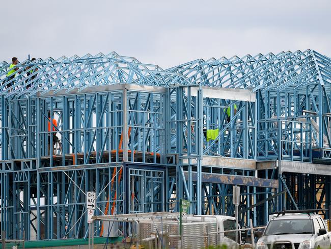 Construction workers are seen working on a new housing development at Kellyville, amid public concern there is not enough housing in Sydney to fit the growing population. Picture: AAP Image