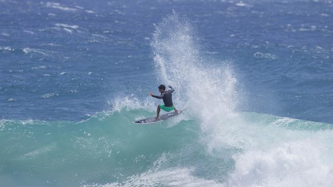 Surfers enjoying the larger swell at Snapper Rocks on Sunday 2 January 2022. Picture: Jerad Williams