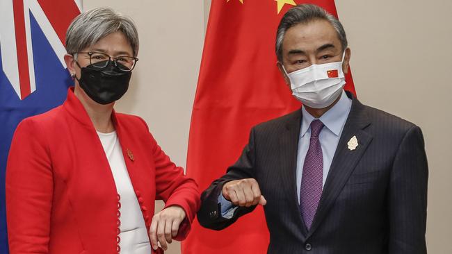 Penny Wong with Chinese Foreign Minister Wang Yi in Bali on Friday. Picture: Johannes P. Christo