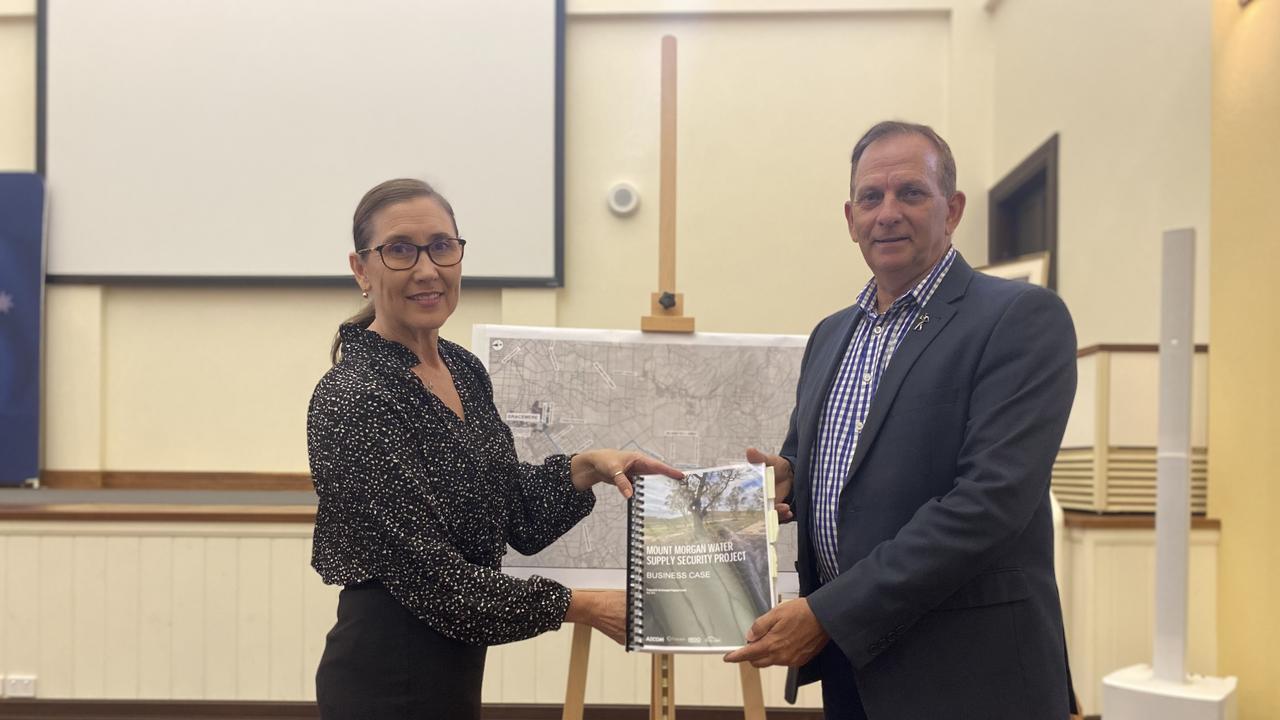 Rockhampton Regional Council spokeswoman for Water and Environmental Sustainability Donna Kirkland and Mayor Tony Williams with the detailed business case for the Mount Morgan pipeline.