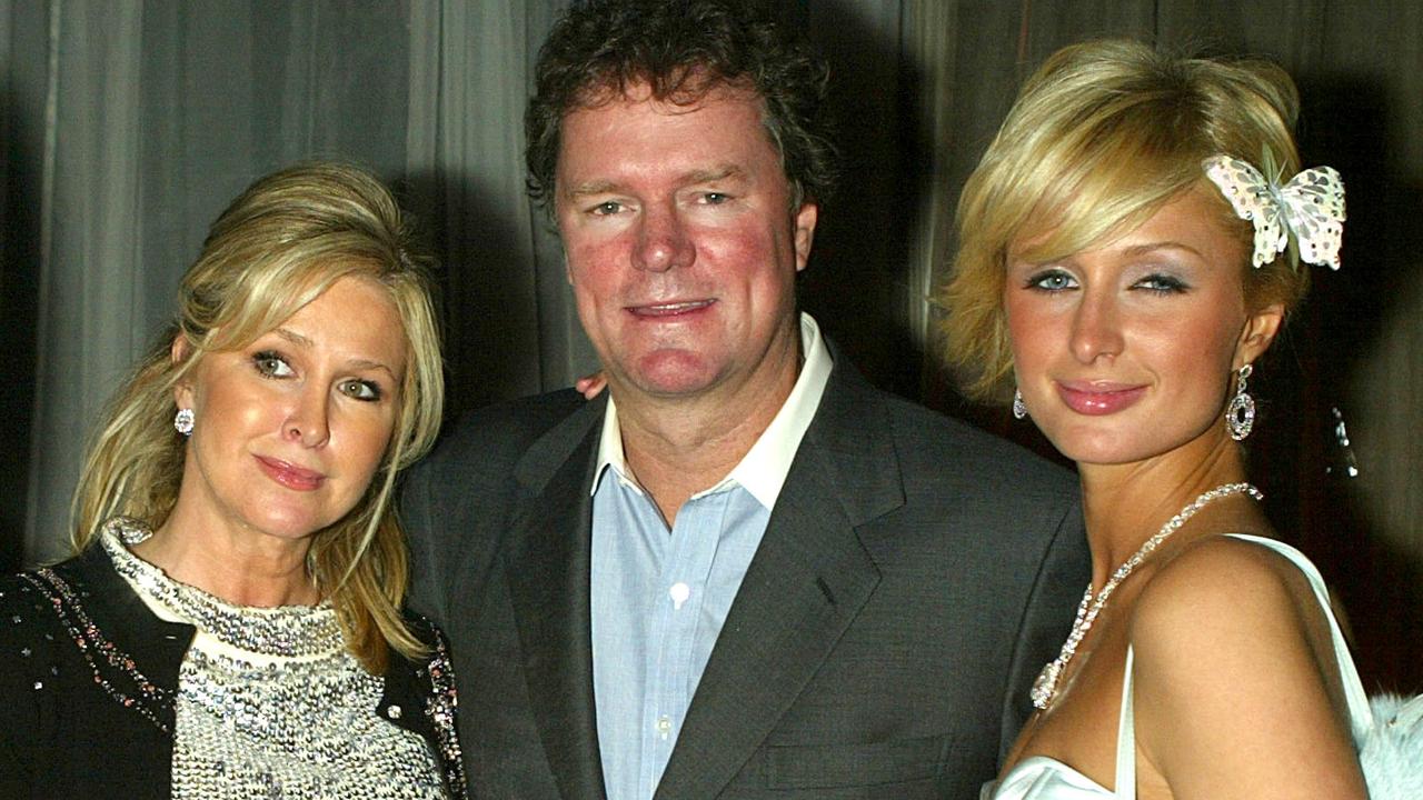 Kathy Hilton with her daughter Paris and husband Rick in 2004. Picture: Kevin Winter/Getty Images