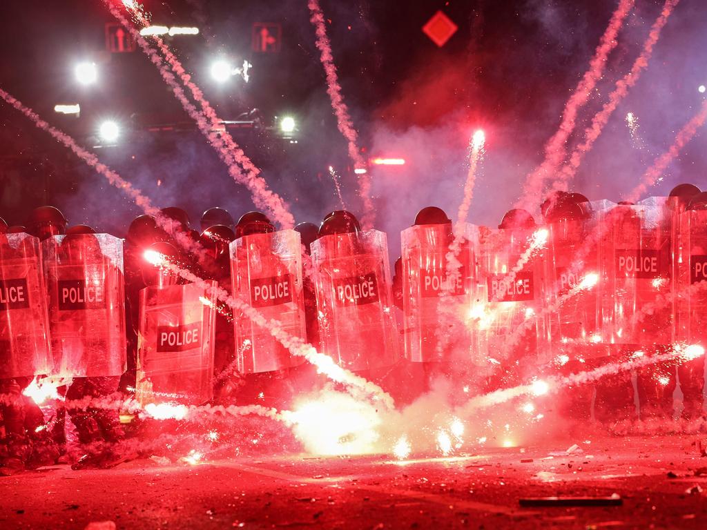 Fireworks were hurled towards riot police. Picture: Giorgi ARJEVANIDZE / AFP