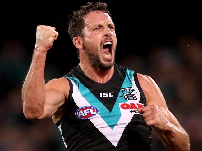 ADELAIDE, AUSTRALIA - APRIL 26: Travis Boak of the Power celebrates a goal during the 2019 AFL round 06 match between the Port Adelaide Power and the North Melbourne Kangaroos at Adelaide Oval on April 26, 2019 in Adelaide, Australia. (Photo by James Elsby/AFL Photos/Getty Images)