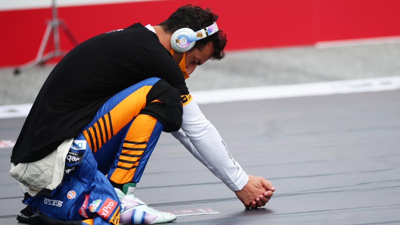 SPIELBERG, AUSTRIA - JULY 04: Daniel Ricciardo of Australia and McLaren F1 prepares to drive on the grid before the F1 Grand Prix of Austria at Red Bull Ring on July 04, 2021 in Spielberg, Austria. (Photo by Peter Fox/Getty Images)