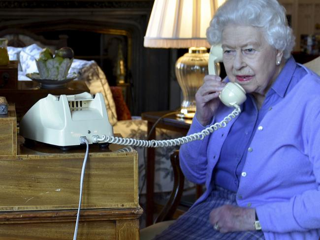 Queen Elizabeth, pictured on the phone to British PM Boris Johnson. Picture: AP