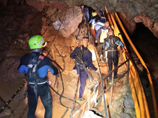 Thai Navy divers in Tham Long cave during rescue operations for the 12 boys and their coach trapped in the cave. Picture: AFP