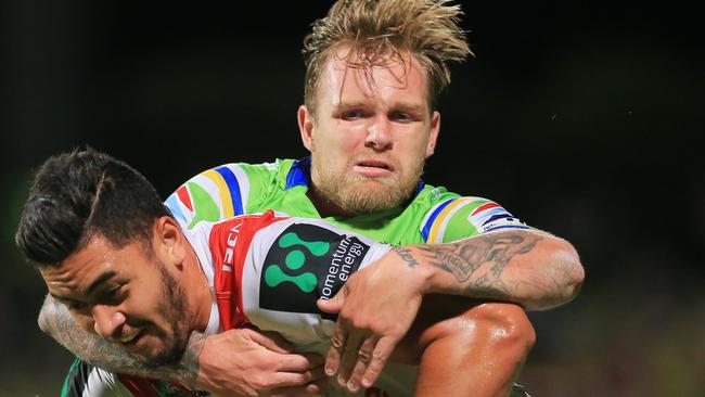 Blake Austin tackles Tim Lafai.