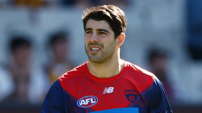 MELBOURNE, AUSTRALIA - MARCH 23: Christian Petracca of the Demons warms up during the 2024 AFL Round 02 match between the Hawthorn Hawks and the Melbourne Demons at the Melbourne Cricket Ground on March 23, 2024 in Melbourne, Australia. (Photo by Michael Willson/AFL Photos via Getty Images)