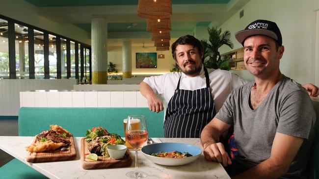 Snapper Rocks executive chef James Fiske and owner David Robinson with reef fish tartar, Eva Valley grass fed rump steak and whole wild caught snapper. Picture: KERI MEGELUS