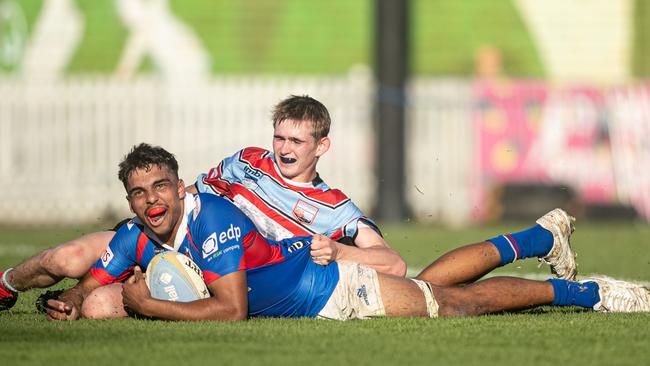 Manly player Ethan Hart scores